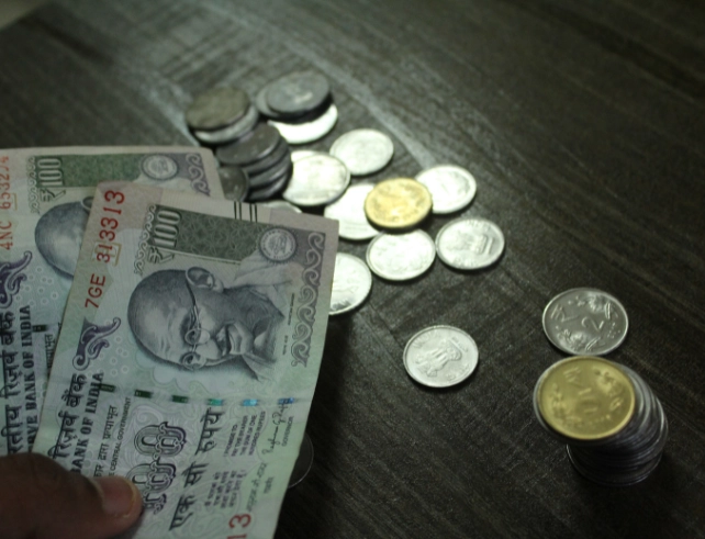 Finance Commission urges RBI not to worry about ₹100 per dollar.